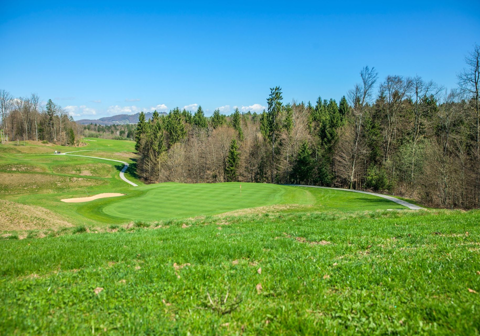 high-angle-shot-golf-course-otocec-slovenia-sunny-summer-day